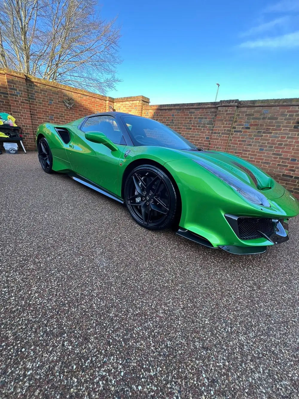 Green Ferrari 488 Pista after machine polishing